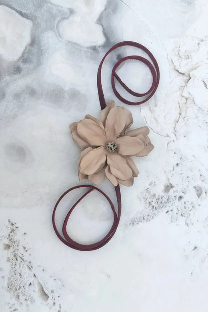 Leather Flower Hair Bow + Headband w/ Dalmatian Stone | Red Cowgirl Hat Band | Yara | Laying on a Stone Table